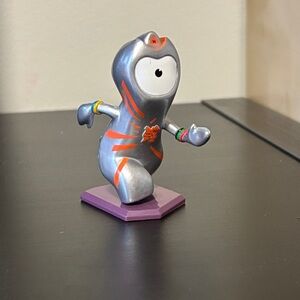 2012 London Olympic Skating Silver and Orange Figure